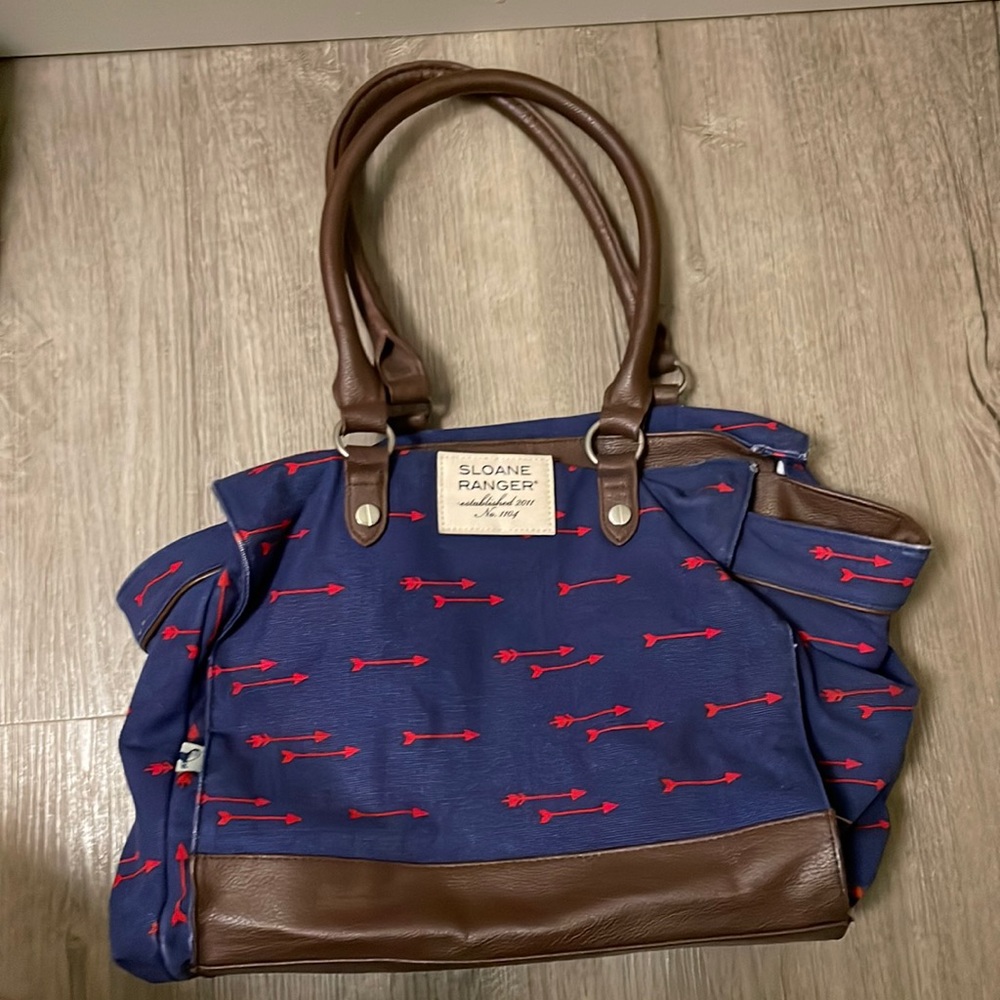 Sloane ranger navy bag with red arrows